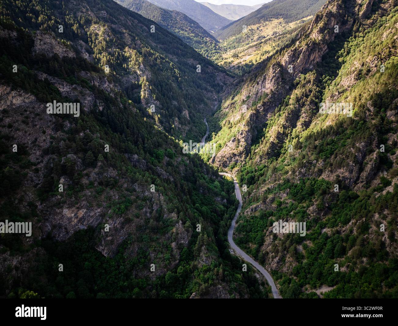 Aerial view forested mountains winding hi-res stock photography and ...