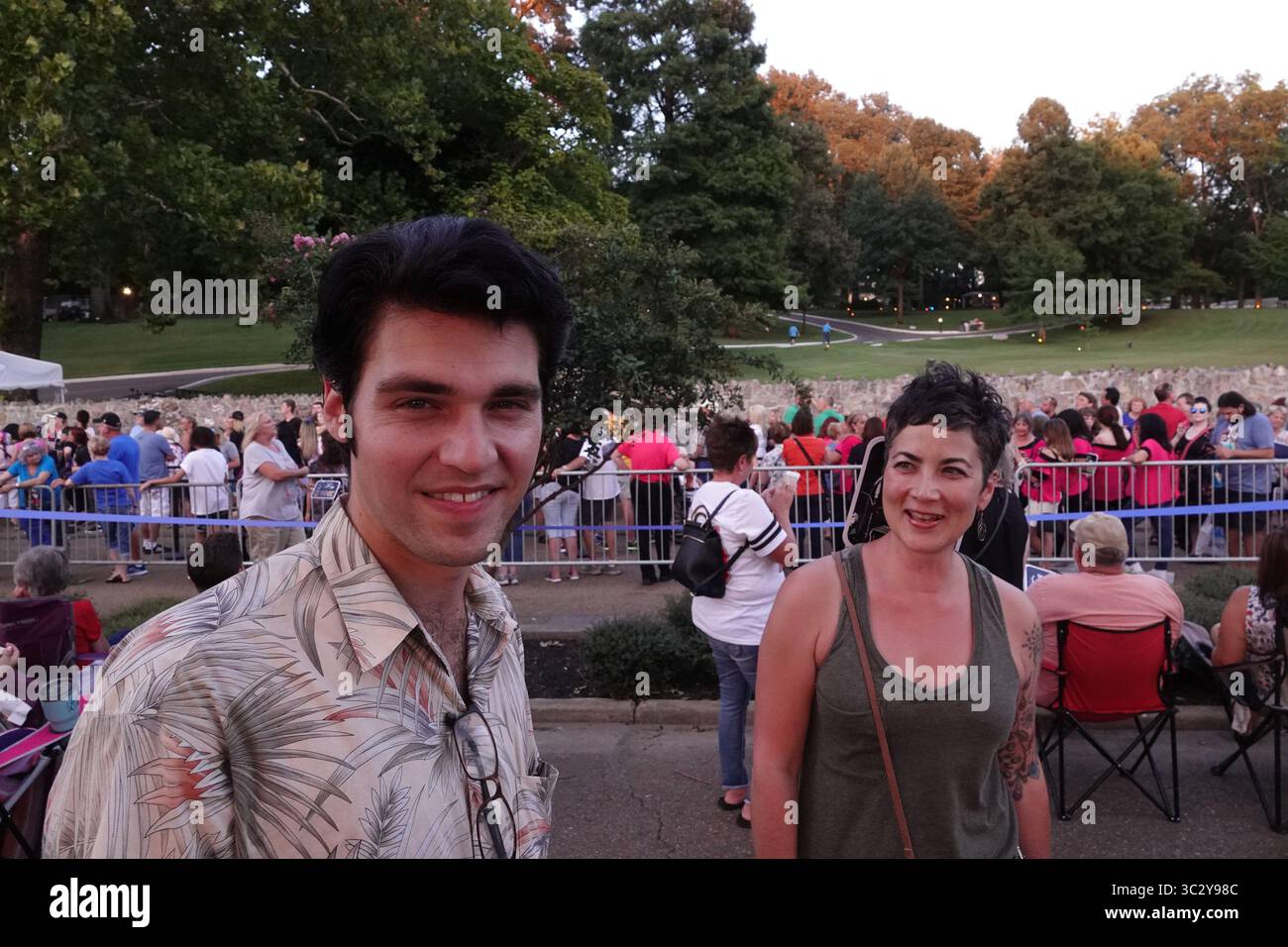 August 15, 2019, Memphis, Tennessee, USA: Elvis Tribute Artist JAKE  SLATER was around the thousands of fans who gathered for the Candlelight Vigil in remembrance of the death of ELVIS PRESLEY at Graceland in Memphis, Tennessee. Presley passed away on August 16, 1977, at the age of 42. In the years since his death, Graceland became a mecca of sorts for his fans, who travel from around the world to Memphis in the days surrounding the anniversary of his death for the annual event known as Elvis Week. (Credit Image: © Karen Focht/ZUMA Wire) Stock Photo