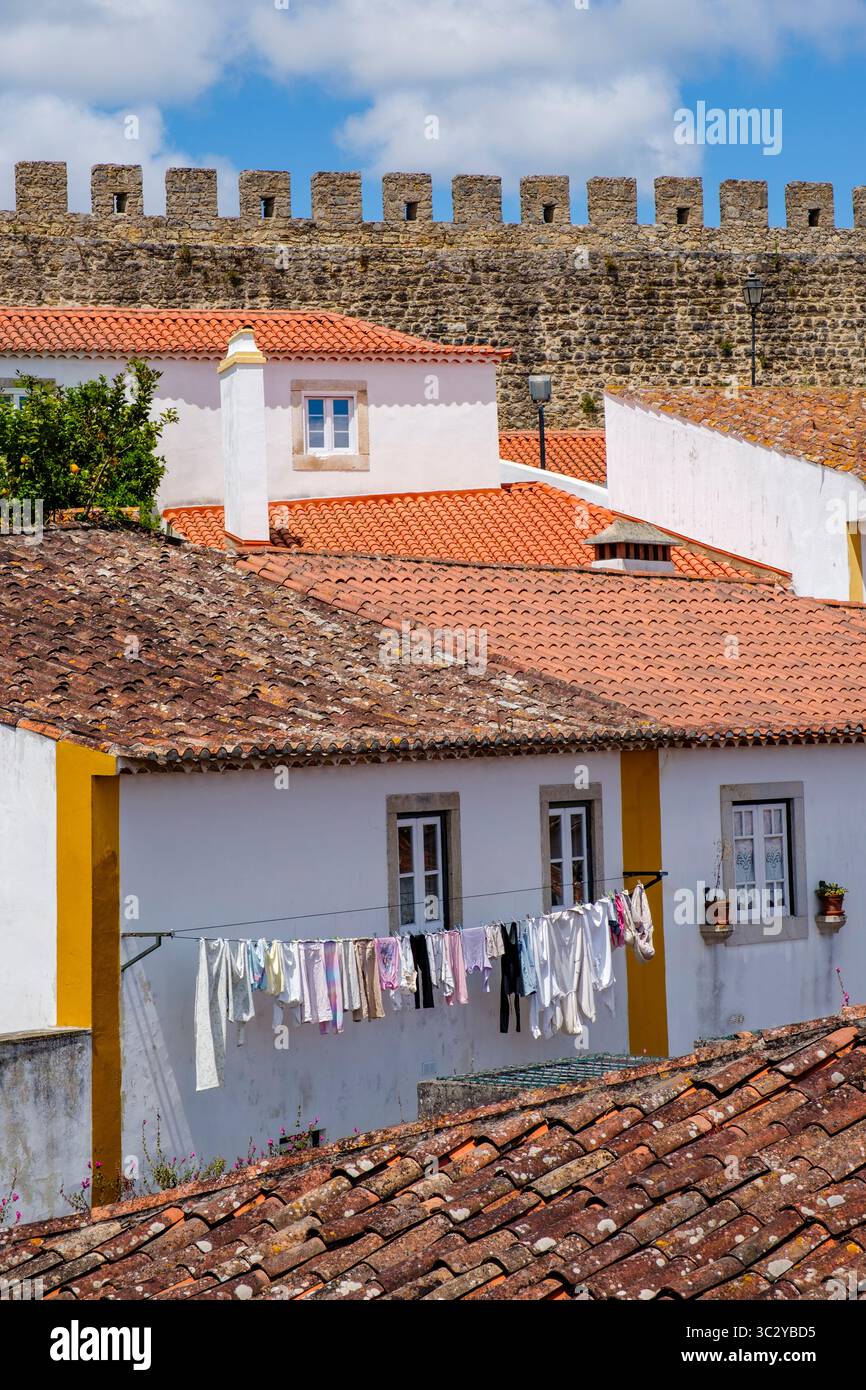 Medieval town of Óbidos, village houses and castle walls, Portugal Stock Photo