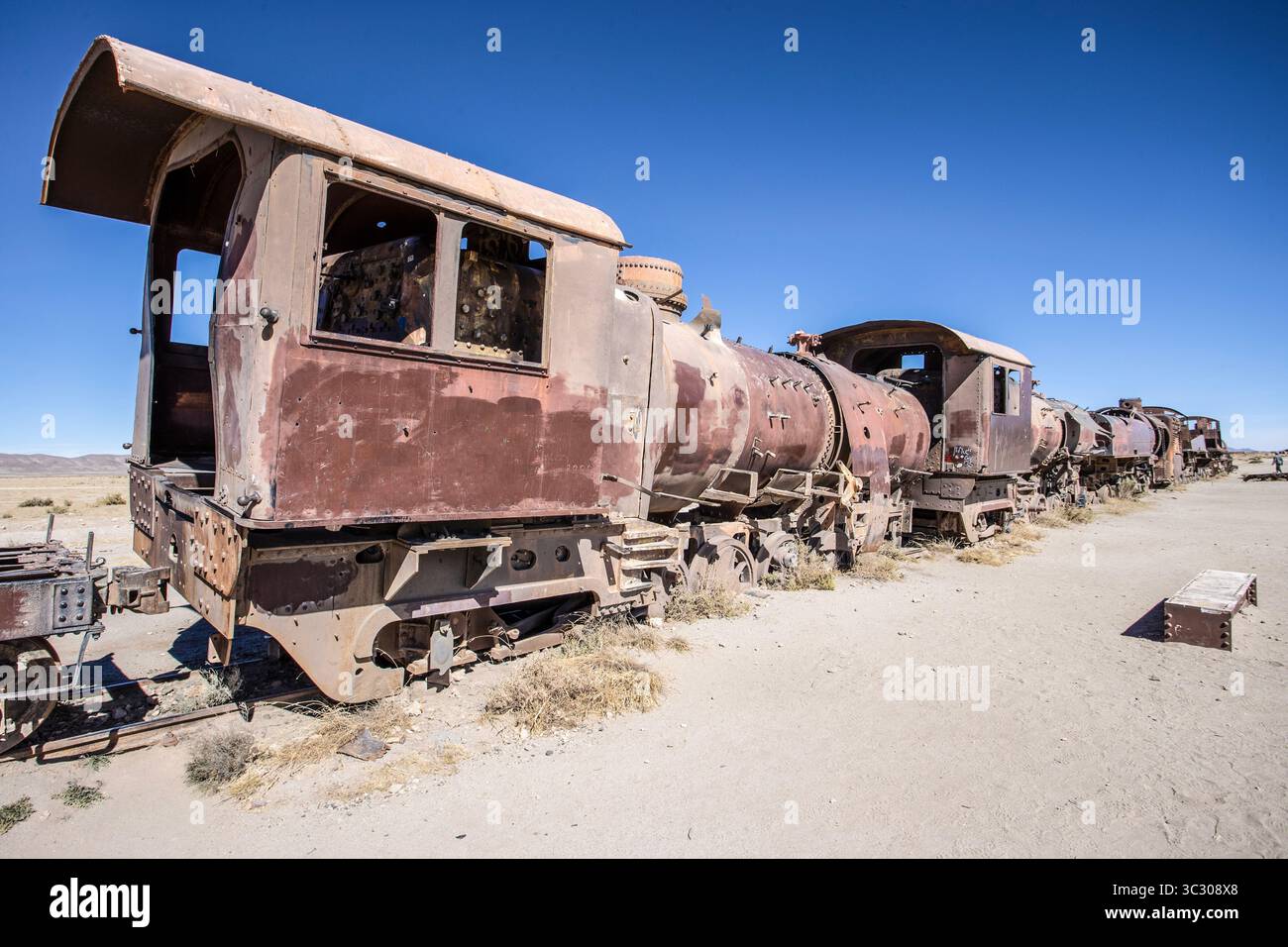 The train graveyard in Uyuni, Bolivia. Wrecks of trains once used in the mining industry. Stock Photo