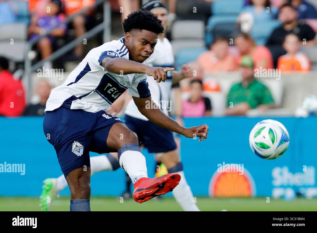 Vancouver Whitecaps midfielder Ralph Priso passes the ball against the