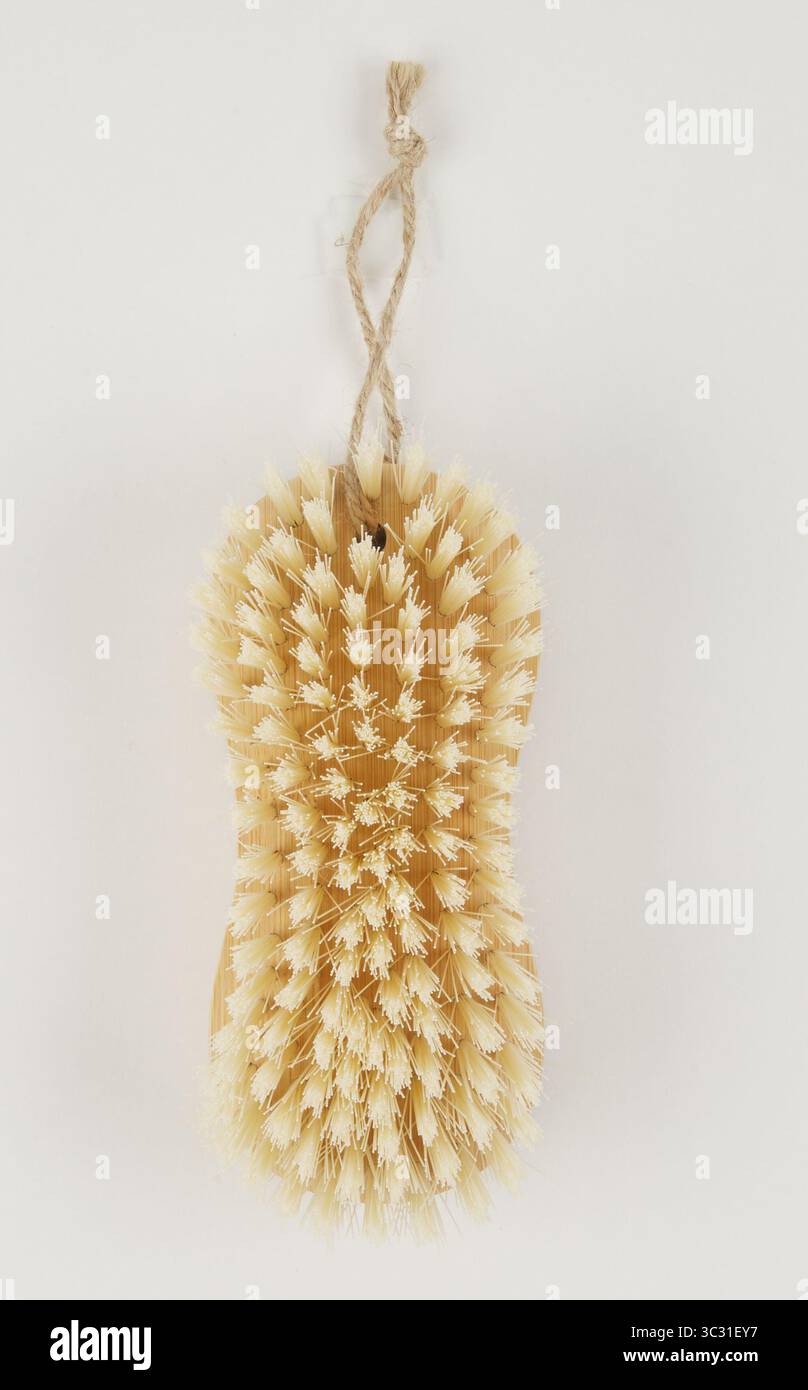 Cleaning brush with hanging rope isolated nature background with ...