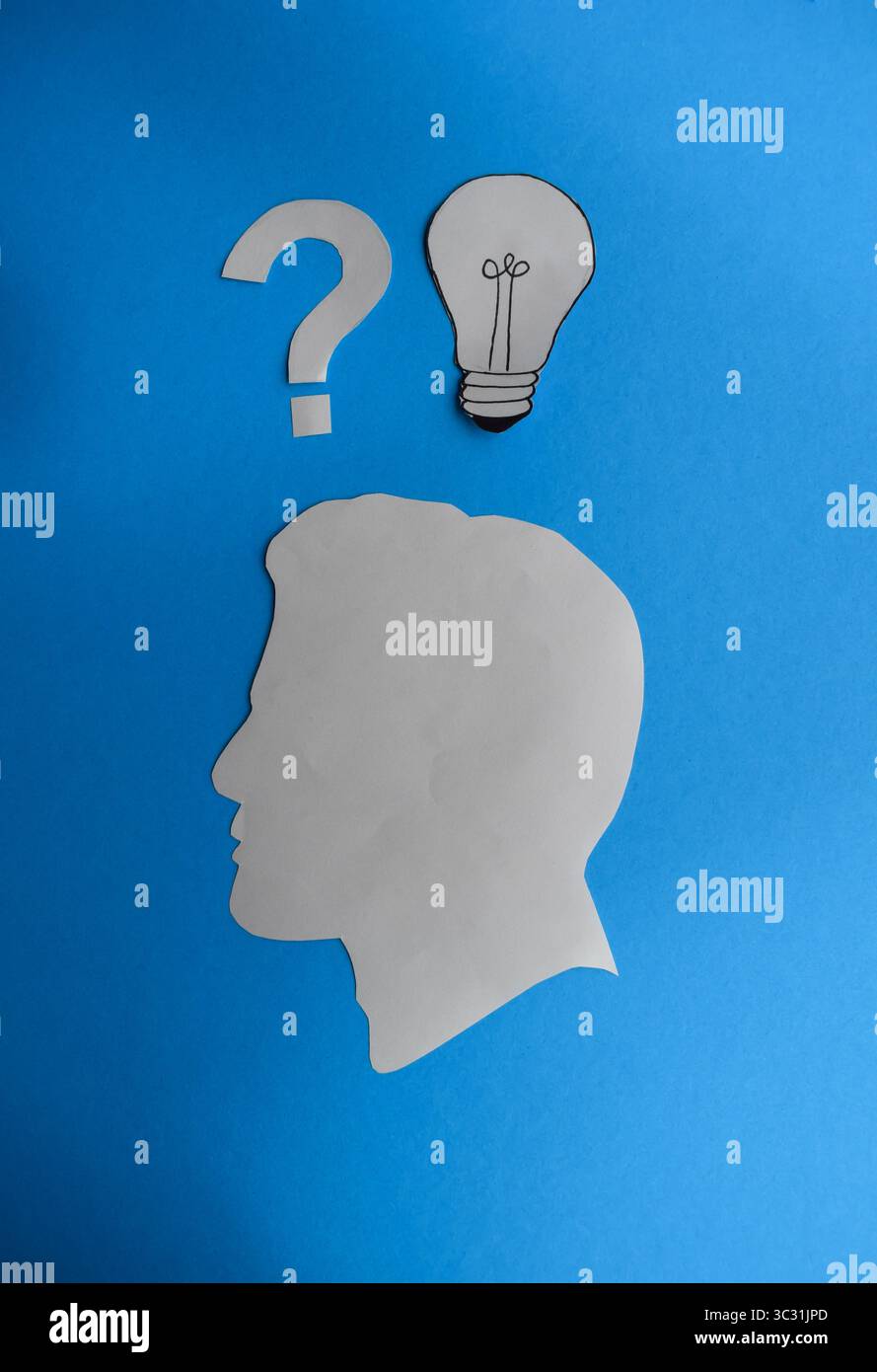 Human Head Silhouette with Blank Speech Bubble and Question Mark Stock Photo