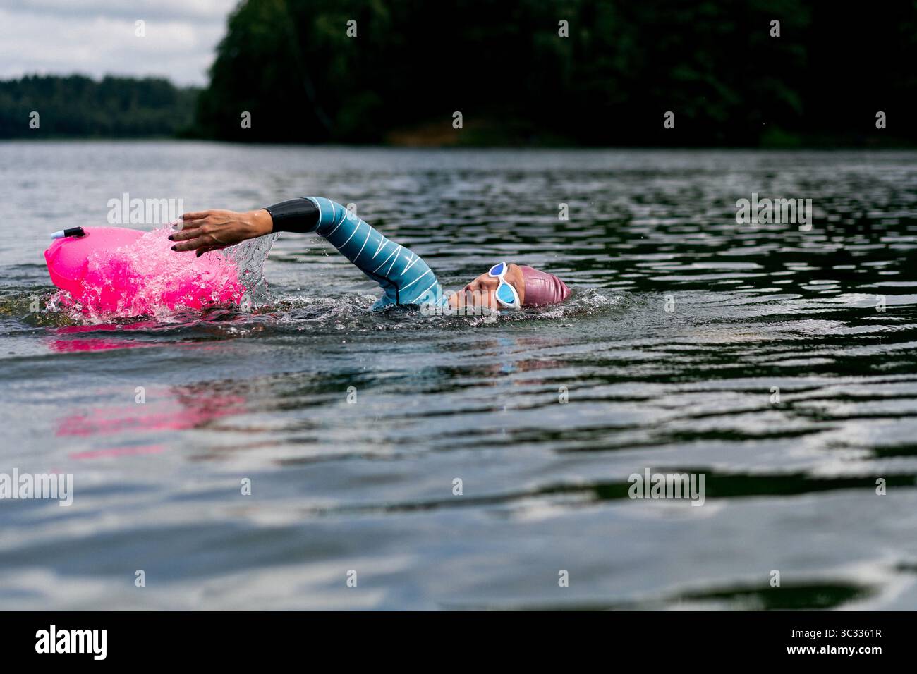 Athletic swimmers in open water hi-res stock photography and images - Alamy