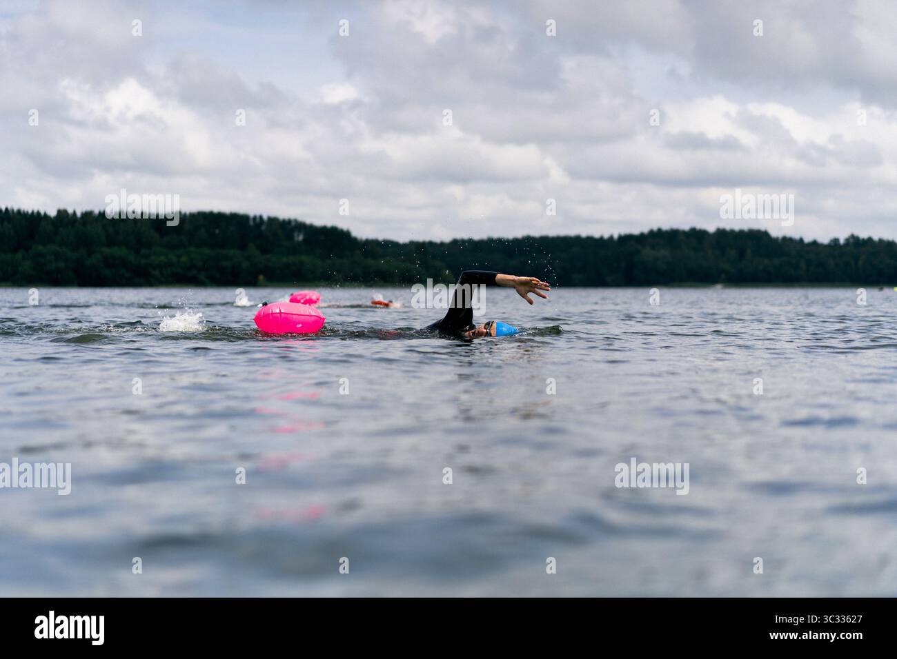 Athletic swimmers in open water hi-res stock photography and images - Alamy
