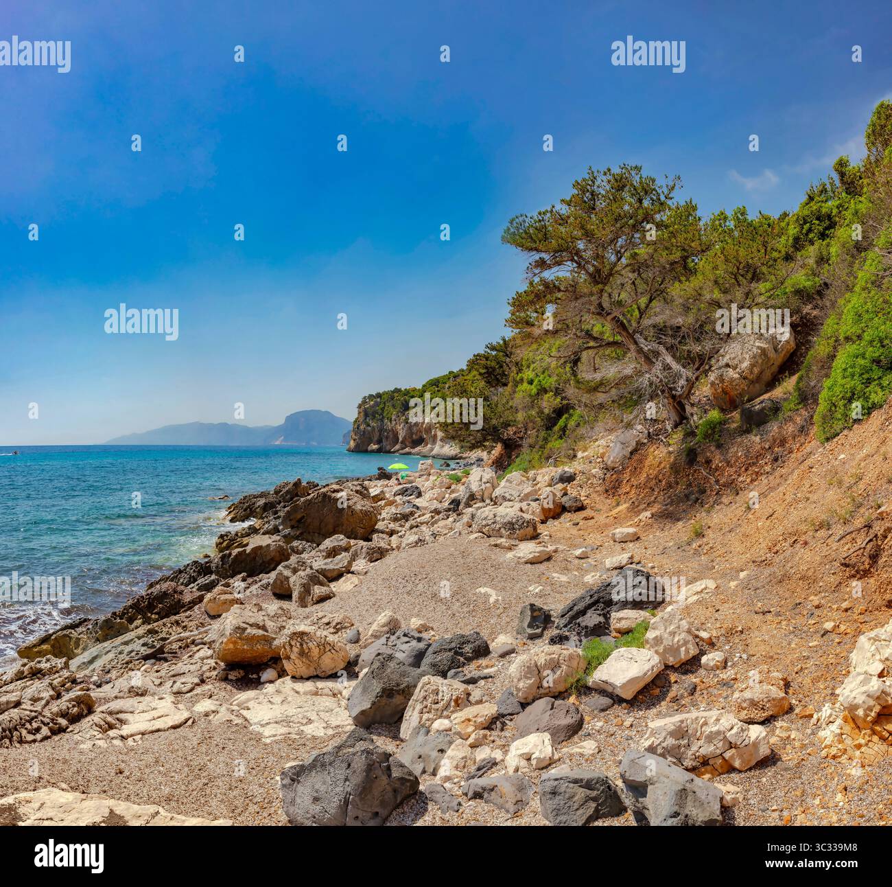 Beach full of rocks called Scorcio su Ziu Martine Stock Photo
