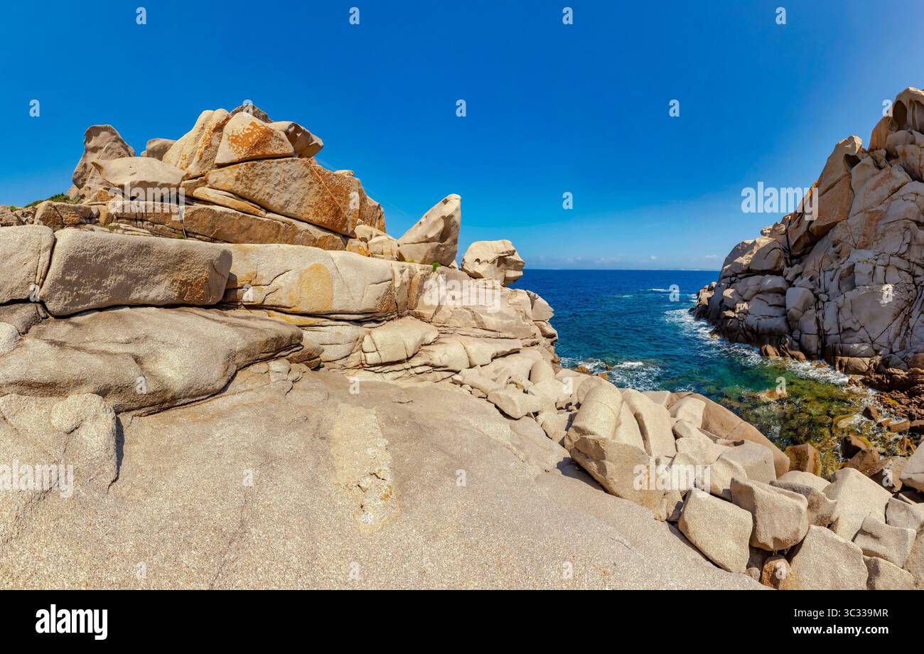 Savage rock formations of Poltusinu at Cala Spinosa on Capo Testa Stock Photo