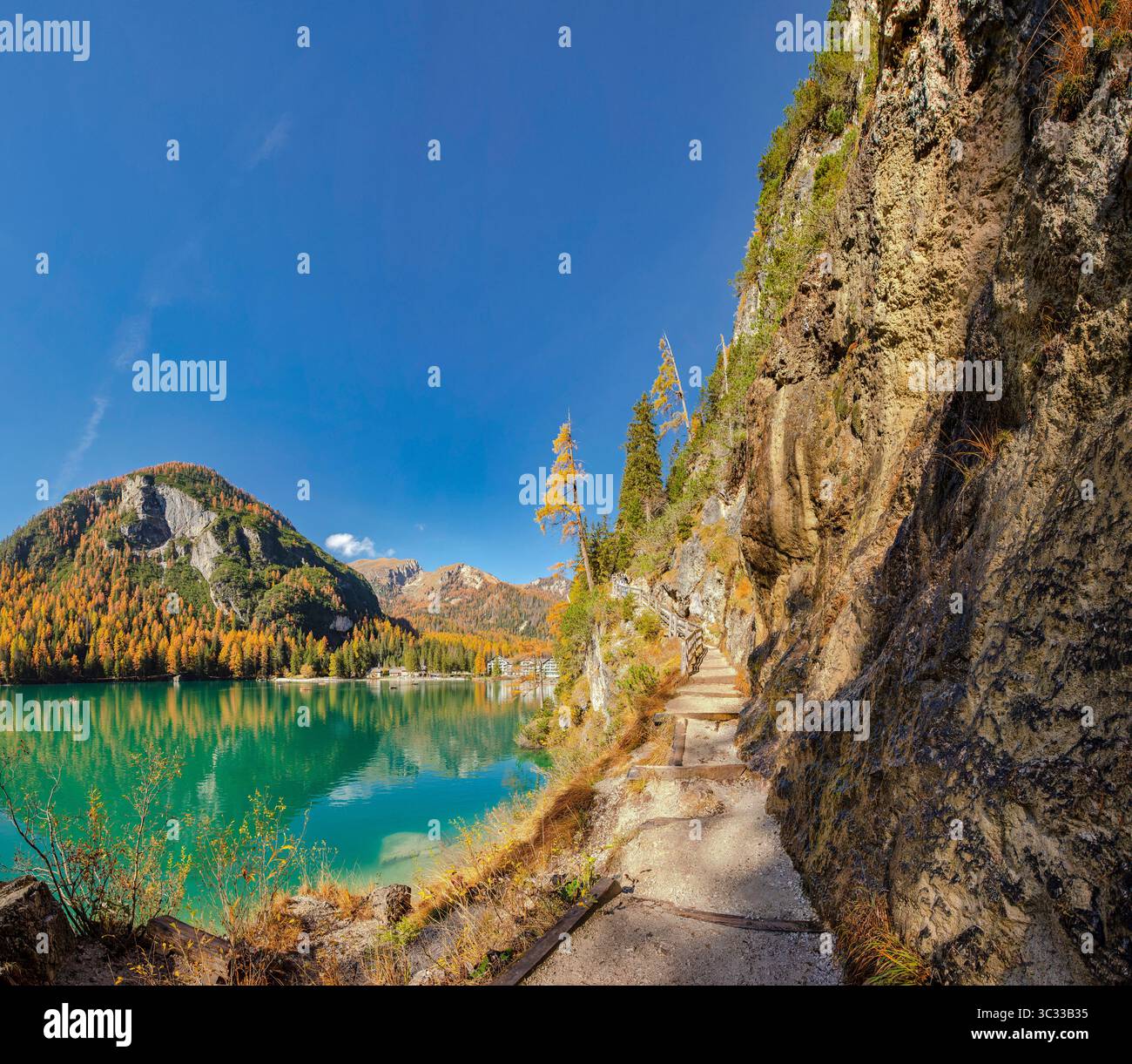 Hiking trail along the high shore of the Pragser Wildsee - Lake Braies Stock Photo
