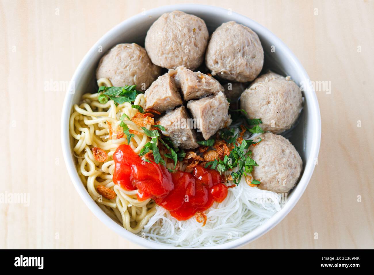 Top view of Bakso (also known as Baso), a popular meatball soup. The ...