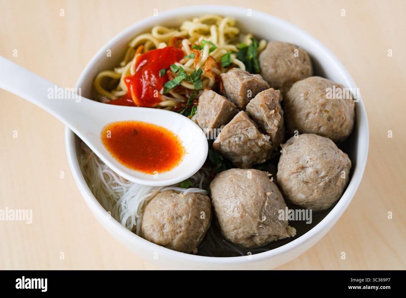Bakso (also known as Baso), a popular meatball soup. The broth is ...