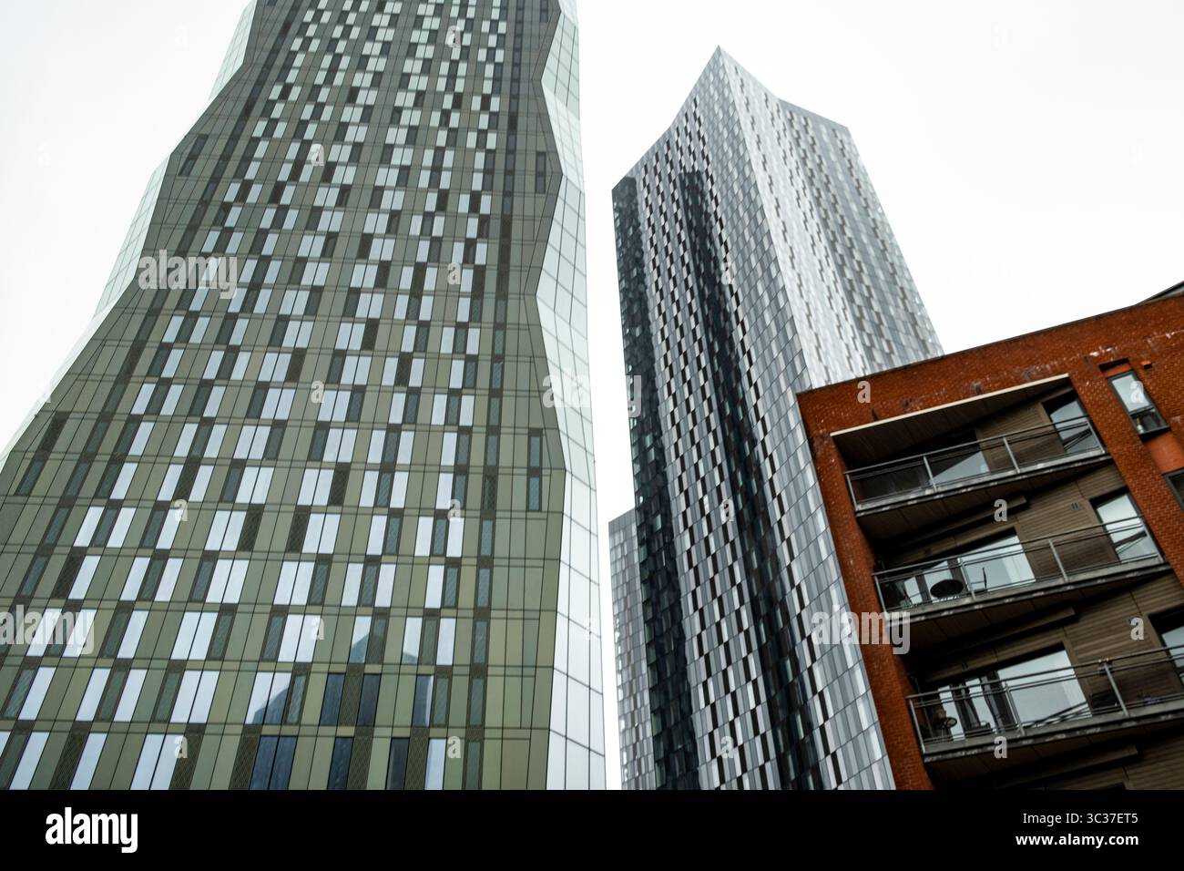 Tower blocks at Deansgate Square, Deansgate, Manchester, UK. Against a grey Mancunian sky Stock Photo