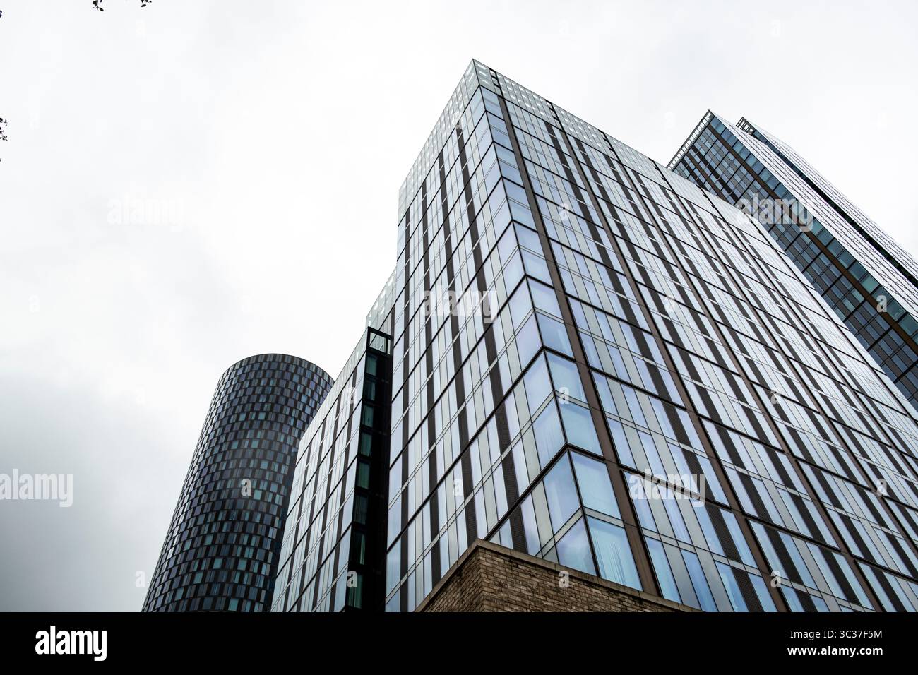 Tower blocks at Deansgate Square, Deansgate, Manchester, UK. Against a grey Mancunian sky Stock Photo