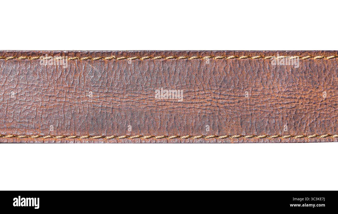 Brown leather strap detail. Closeup of stitched natural material. Macro view of genuine leather texture. Fashion accessory element. Stock Photo