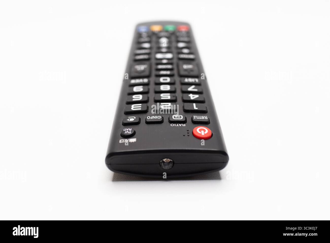 Black Remote with Red Power Button Close up Stock Photo