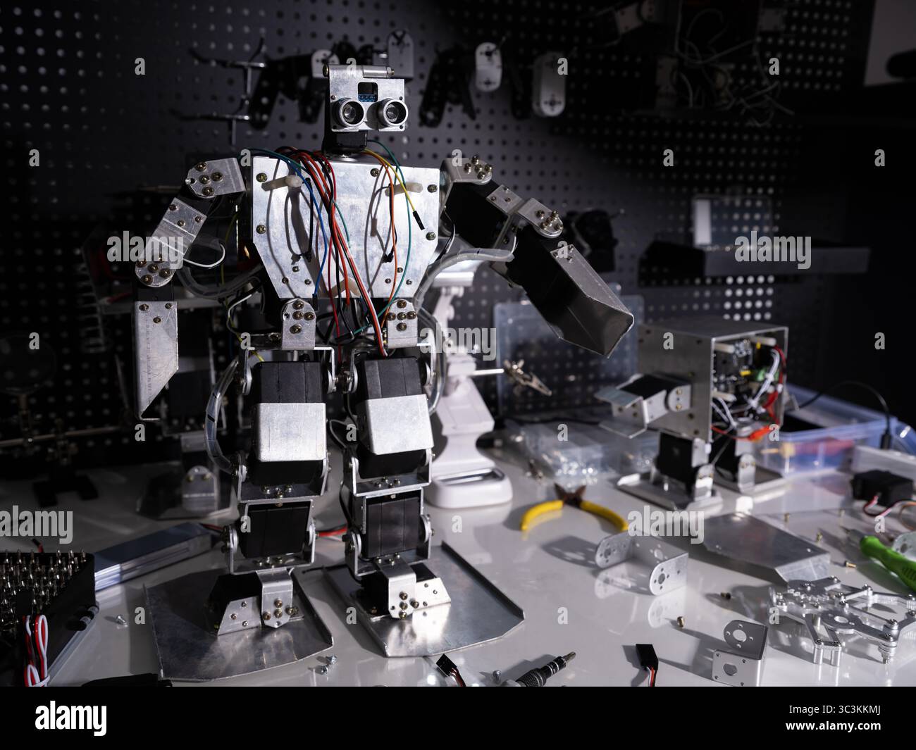 Study on robot on the workbench Stock Photo