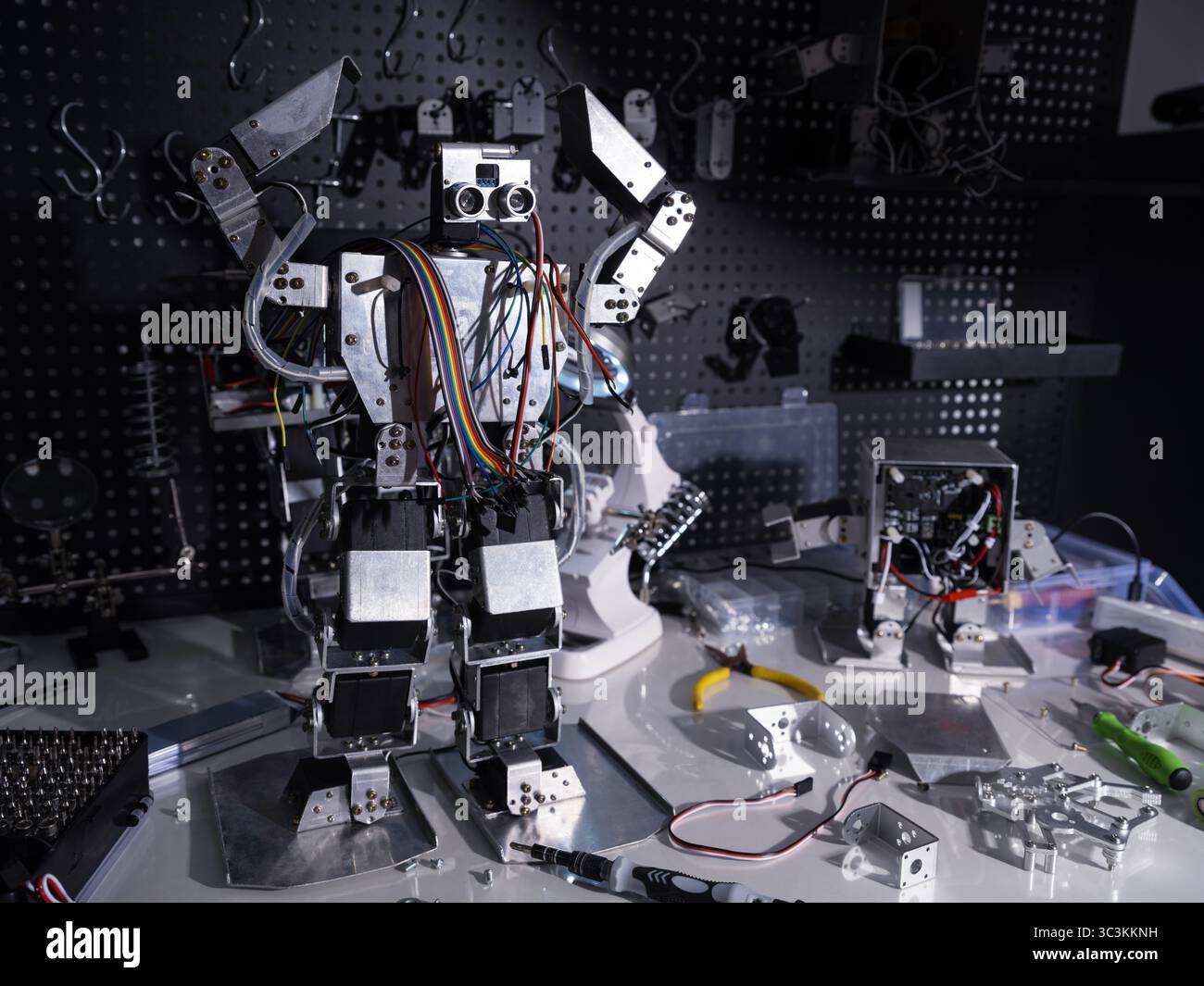 A robot is on the workbench Stock Photo