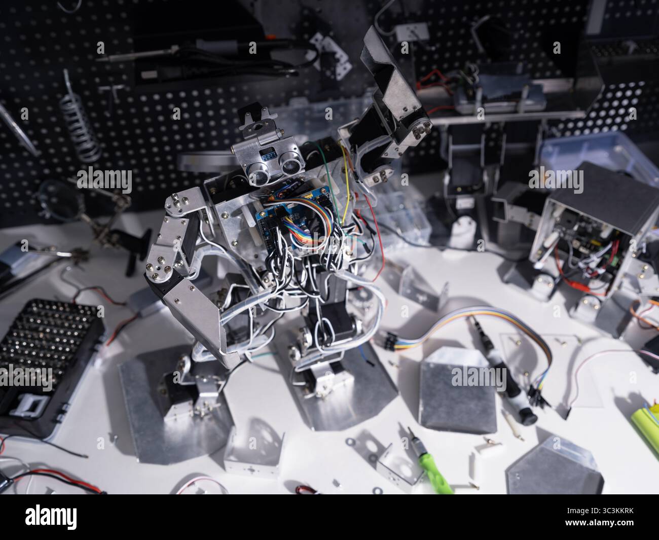Study on robot on the workbench Stock Photo