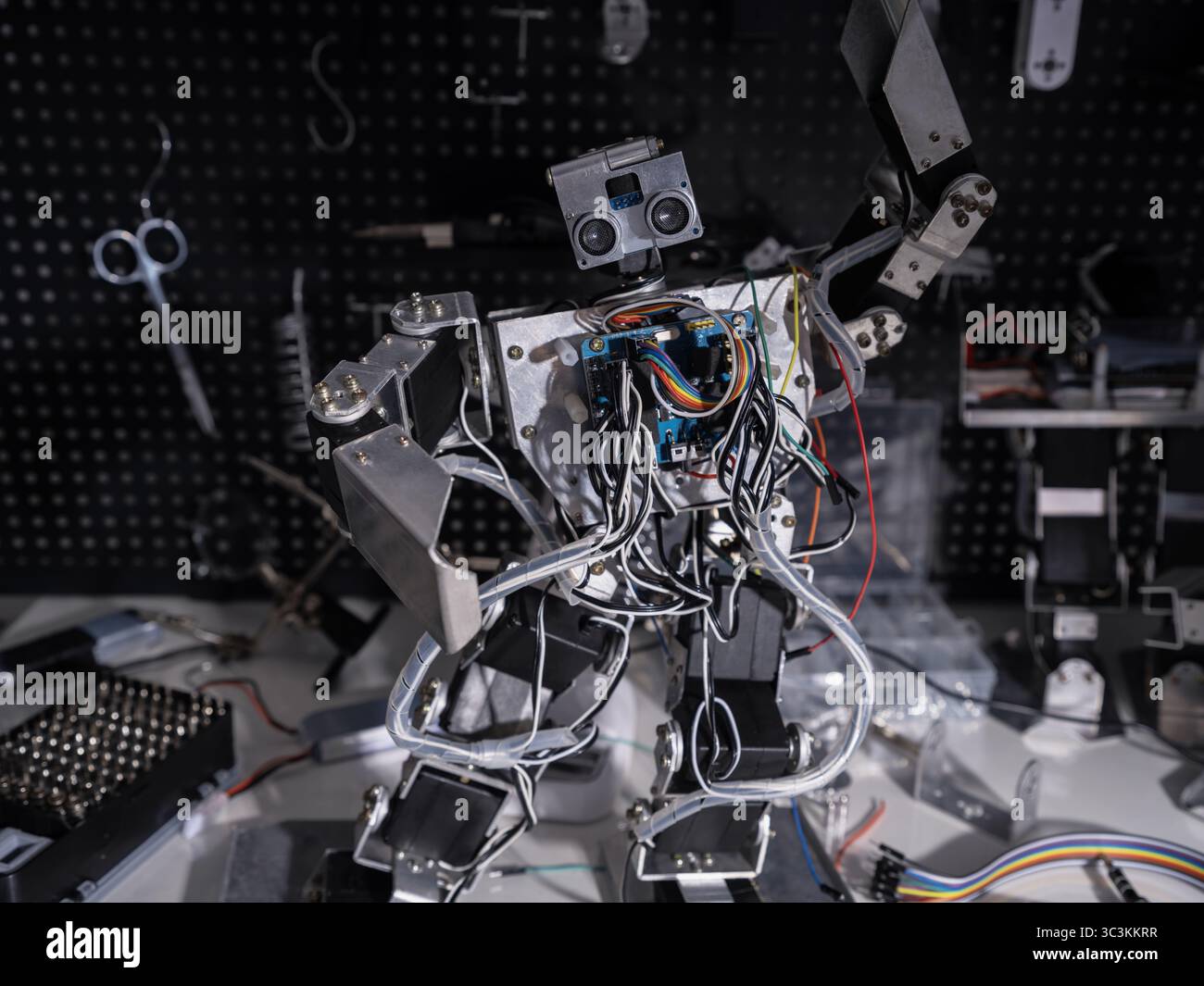A robot is on the workbench Stock Photo
