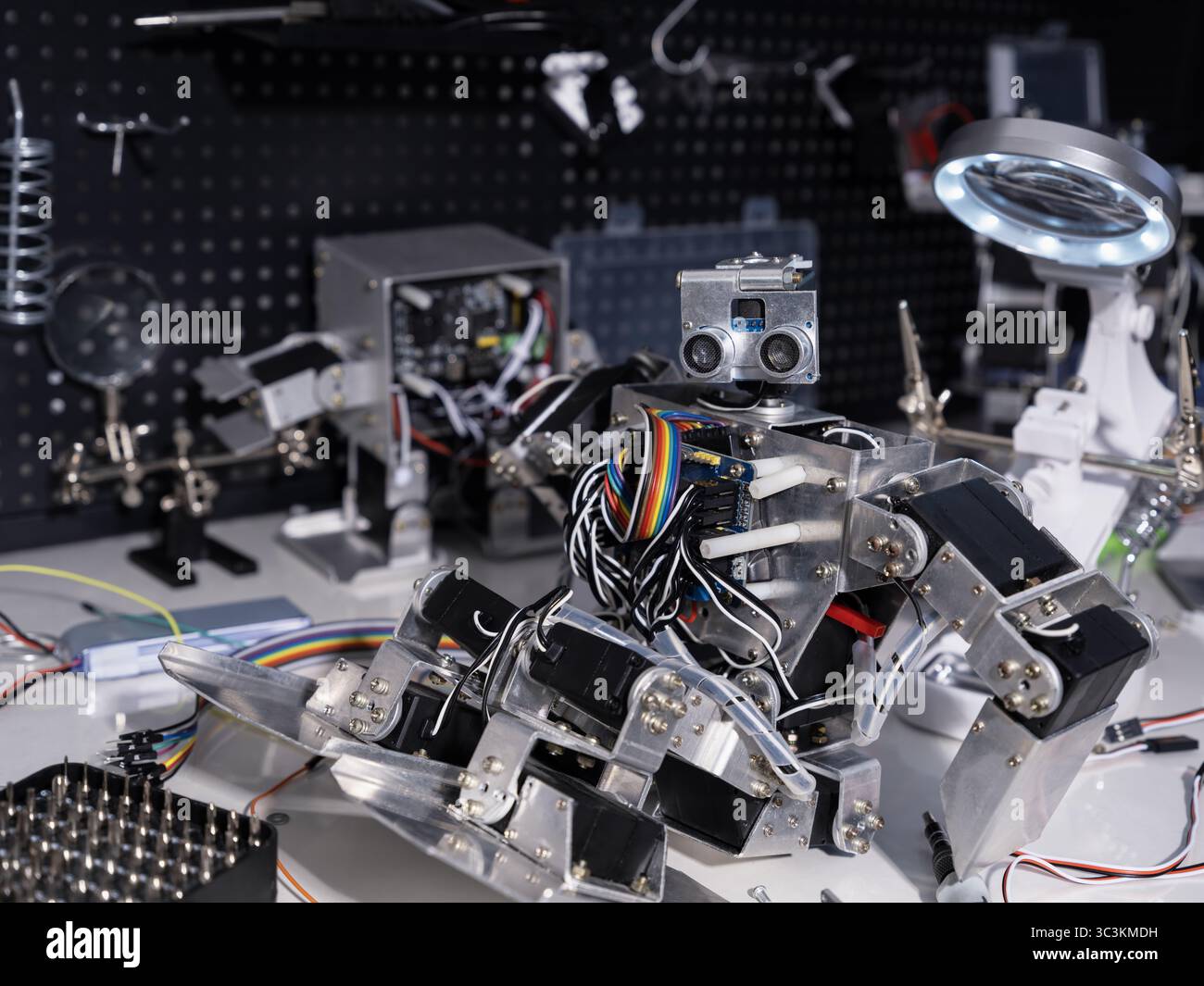 Study on robot on the workbench Stock Photo