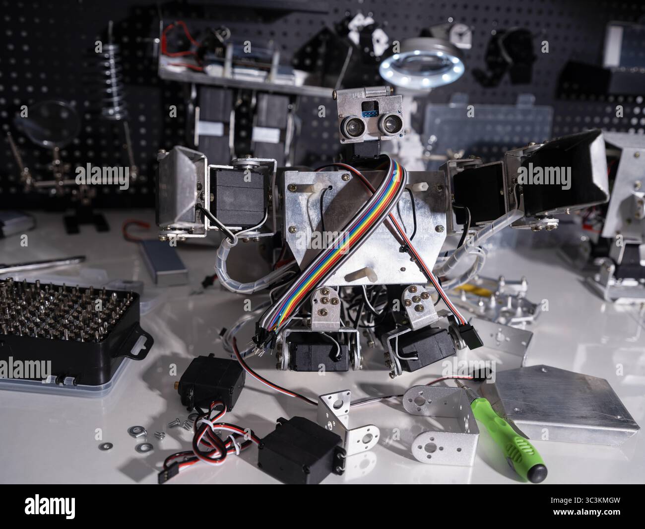 A robot is on the workbench Stock Photo