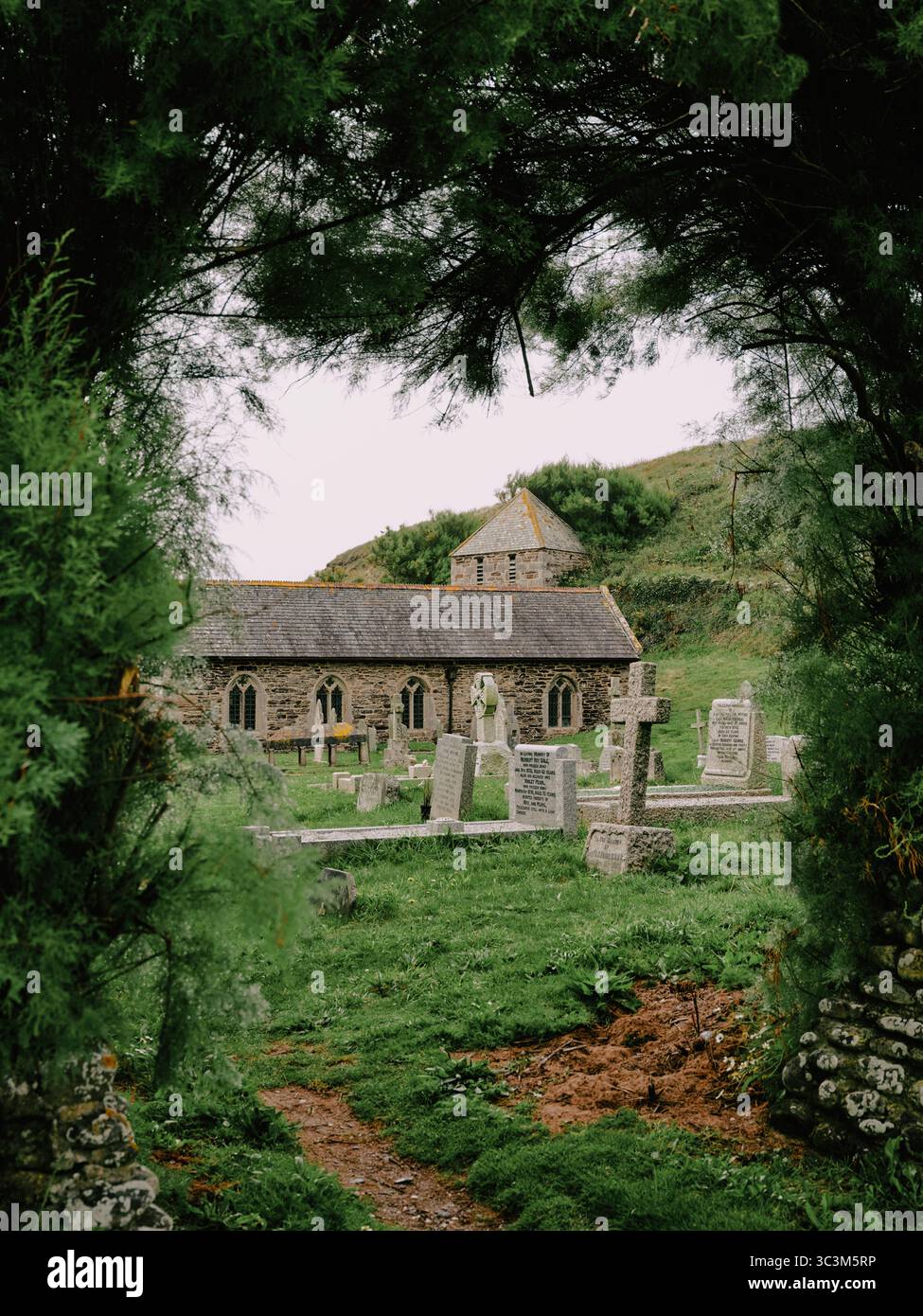 The Church of Saint Winwaloe is the Grade I listed parish church of Gunwalloe in Cornwall, England. Stock Photo
