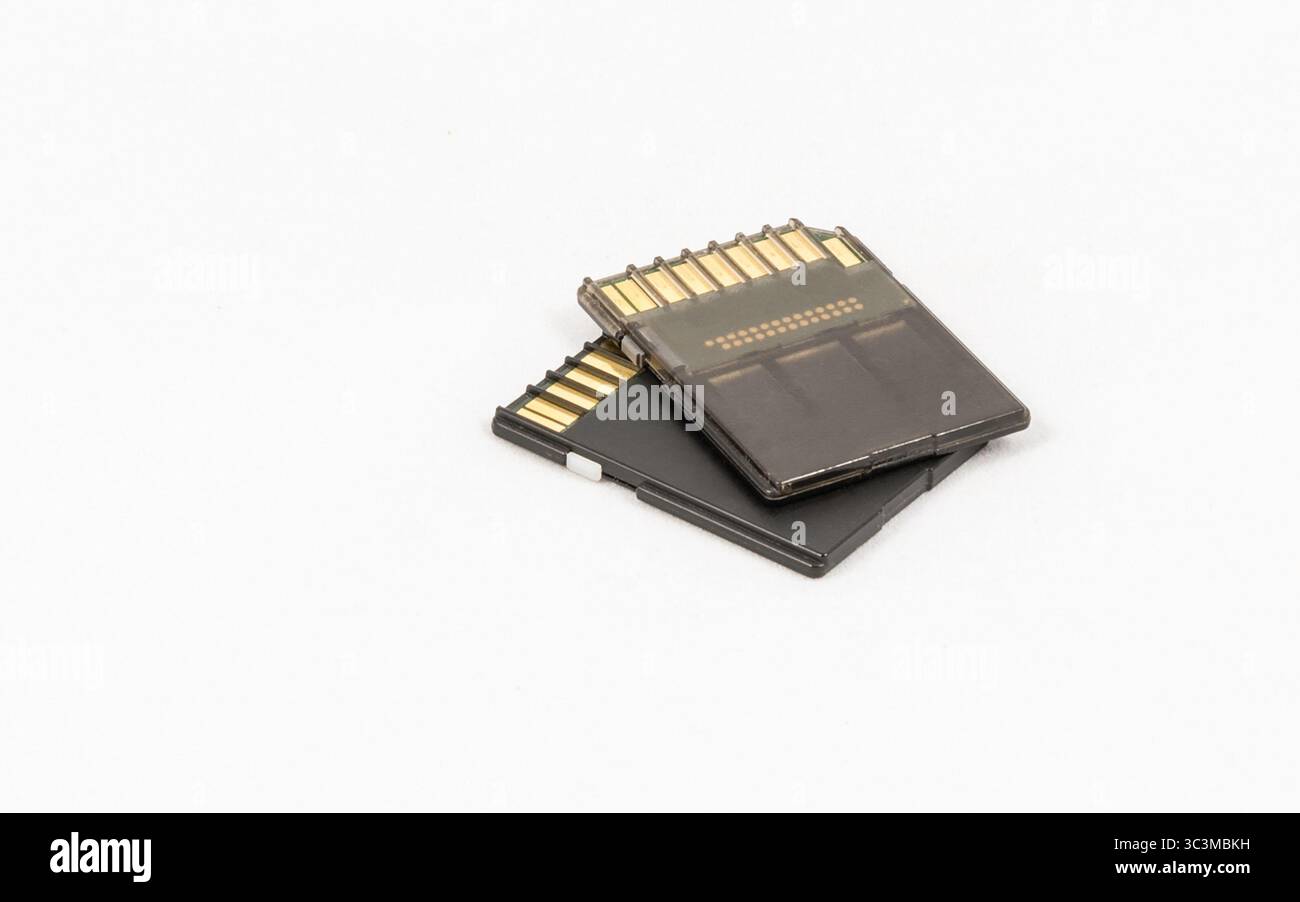 Black unbranded memory SD cards, isolated on white background Stock Photo
