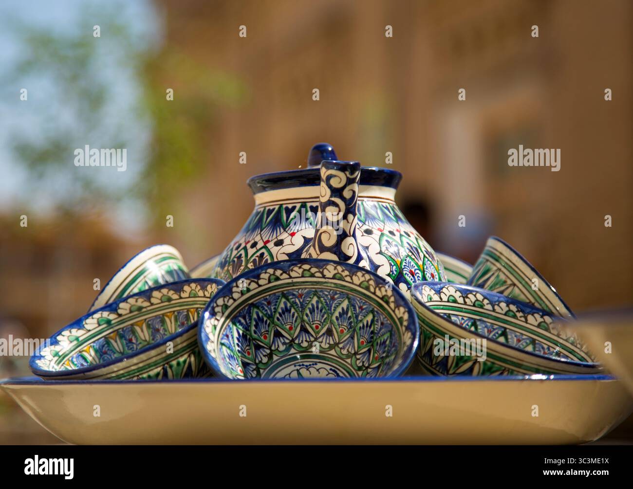Ceramic tableware set with the typical Khorezm patterns. Stock Photo