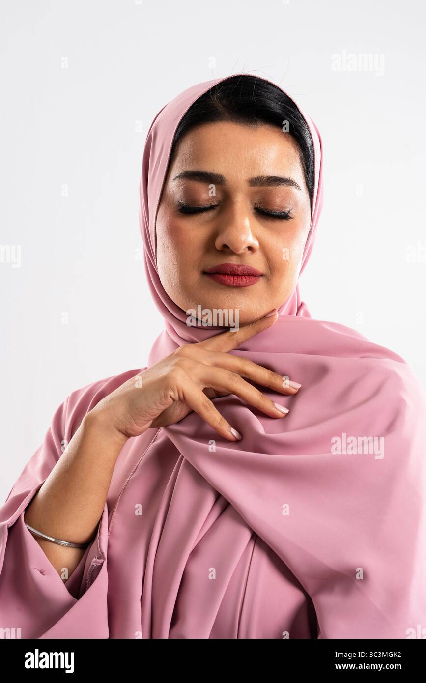 Young woman wearing pink hijab hi-res stock photography and images - Alamy
