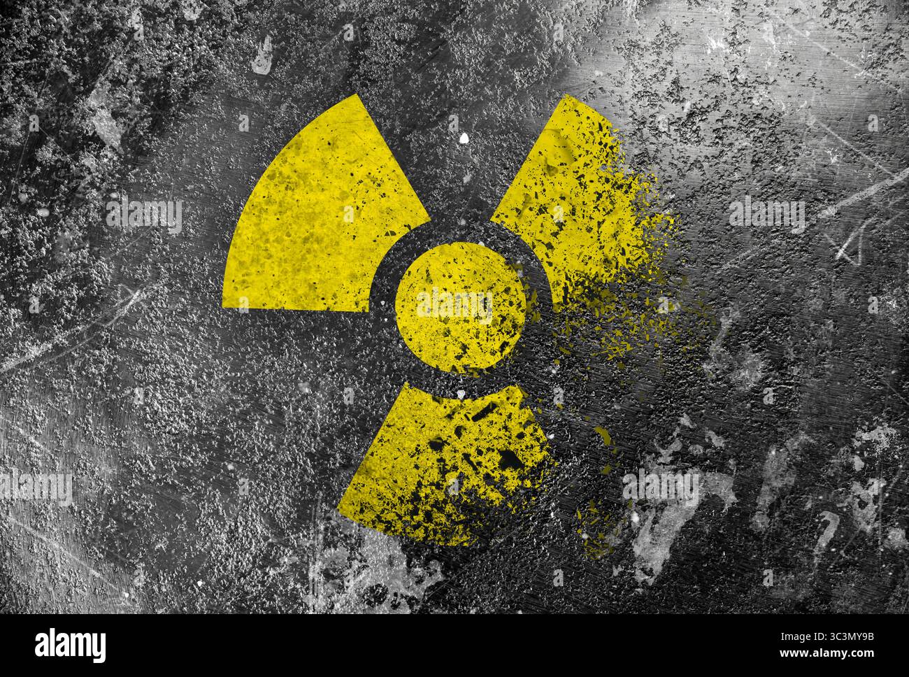 Radioactive sign on grey textured surface. Radiological pollution Stock Photo