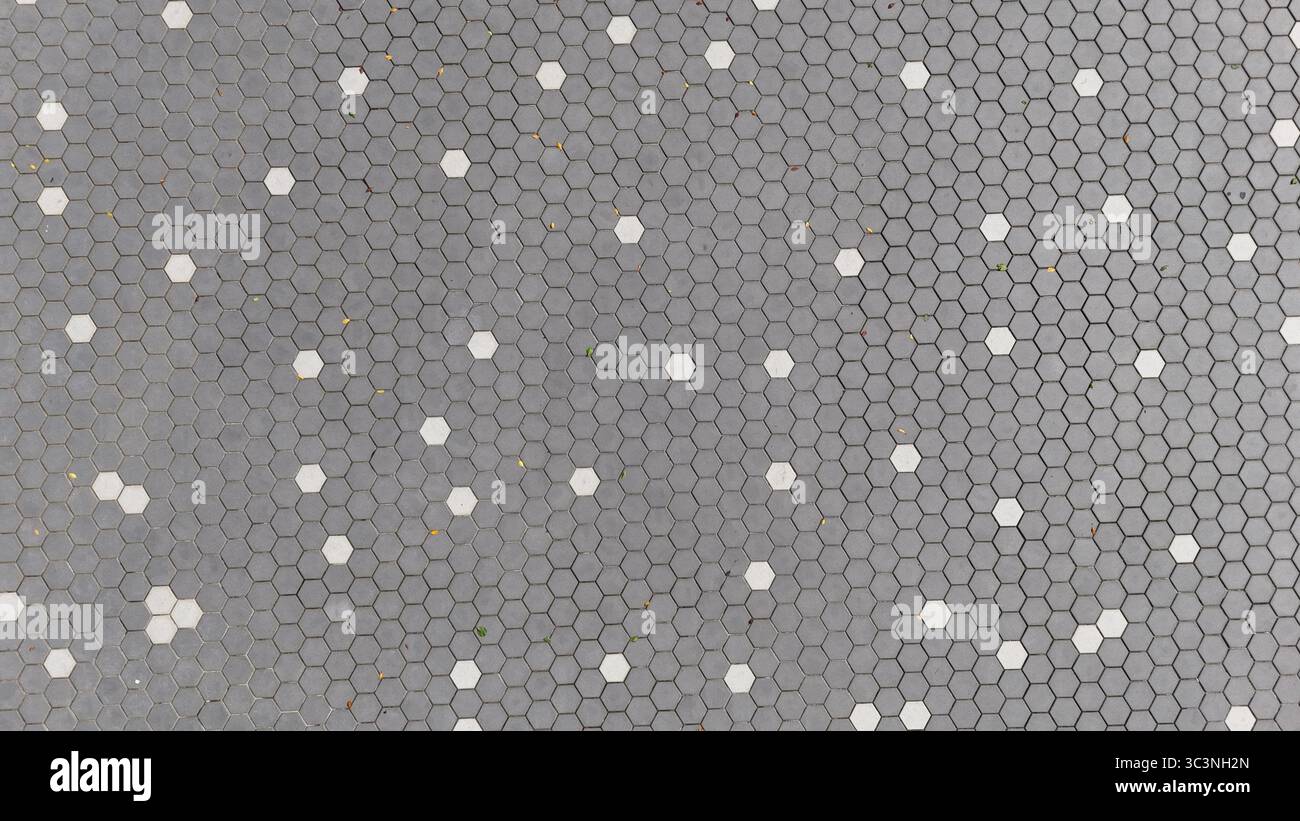 Hexagonal tile pavement surface and Honeycomb concrete ground texture Stock Photo