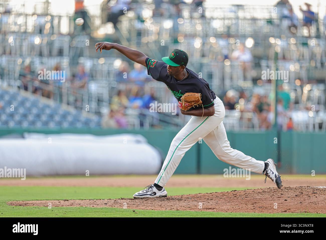 Greensboro, NC: Greensboro Grasshoppers pitcher Carlson Reed (36) warms ...