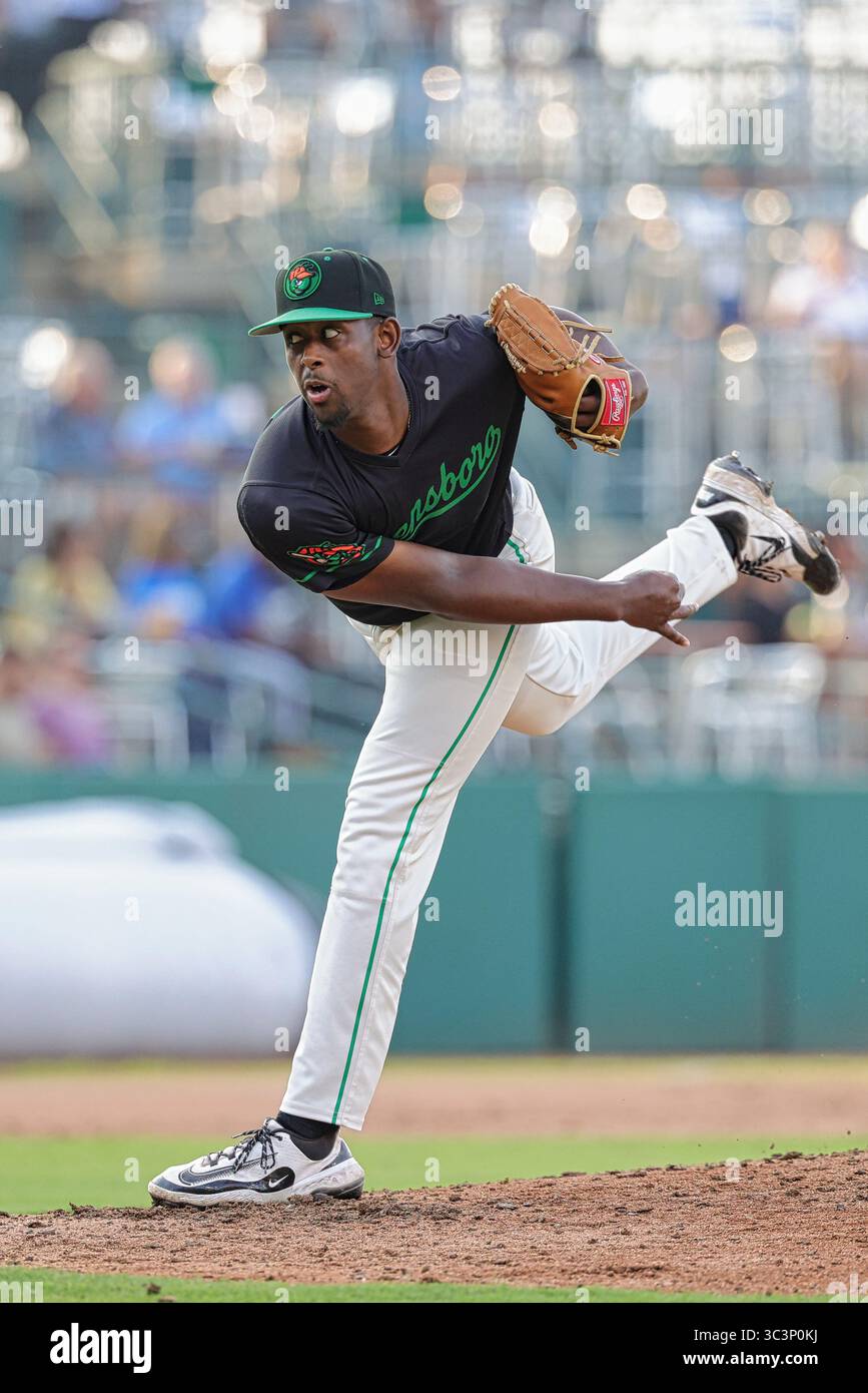 Greensboro, NC: Greensboro Grasshoppers pitcher Carlson Reed (36) warms ...