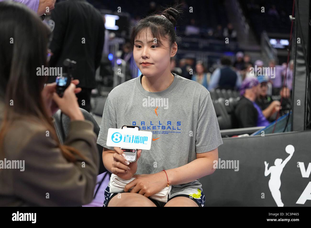 Dallas Wings center Li Yueru (28) being interviewed before their WNBA ...