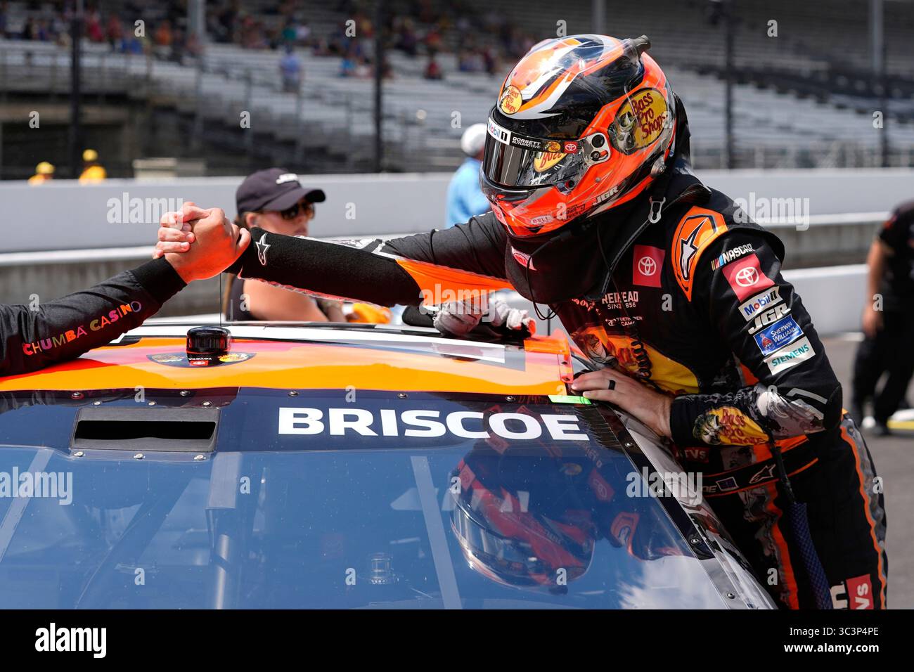 Chase Briscoe Racing Chase Briscoe is congratulated by a crew member after winning the pole ...