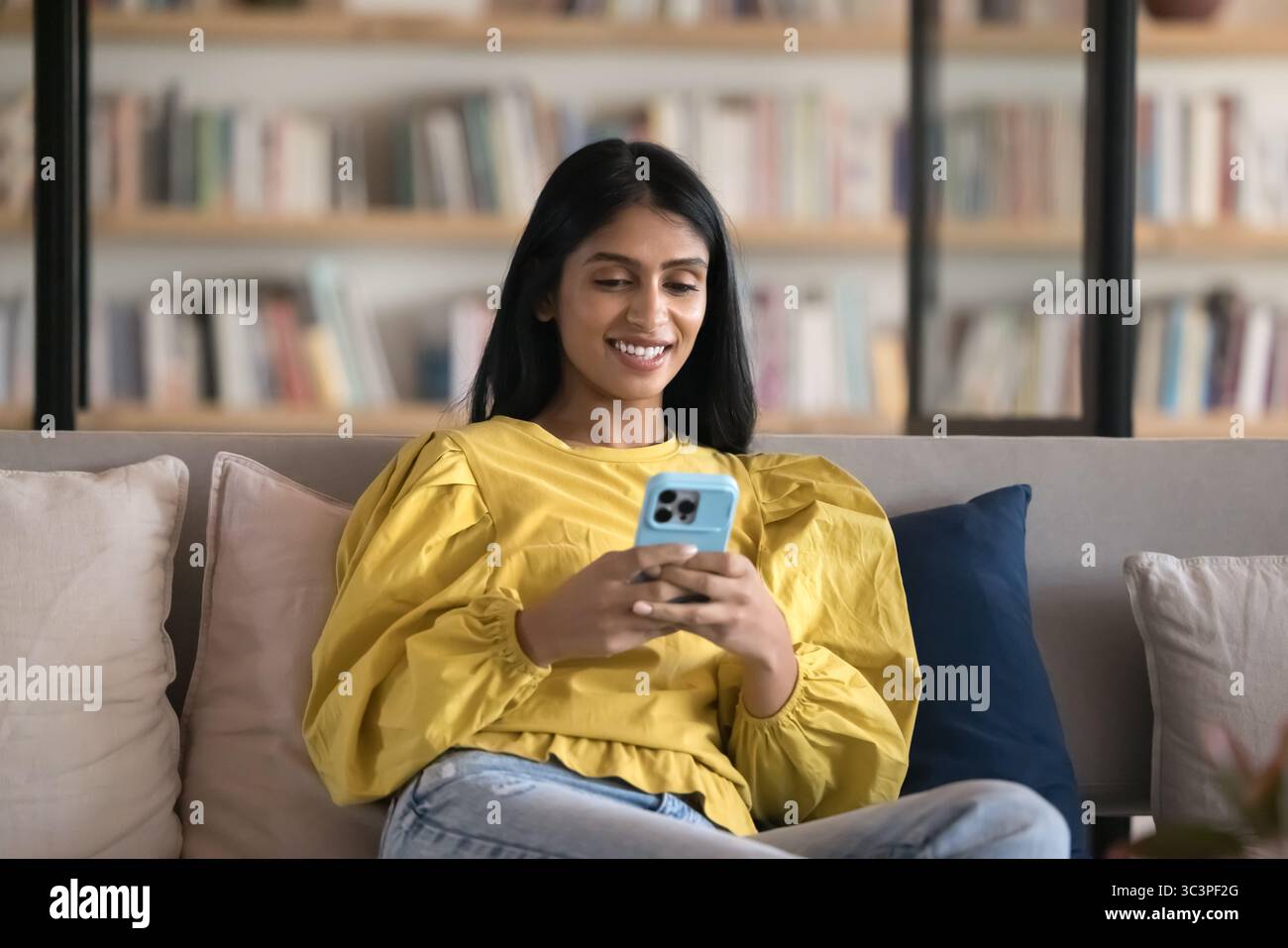 Pretty female comfortably seated hi-res stock photography and images ...