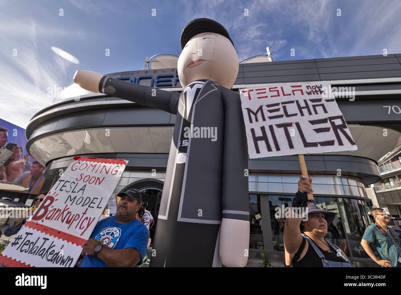Los Angeles, USA. 26th July, 2025. Anti-Tesla and Elon Musk protesters ...