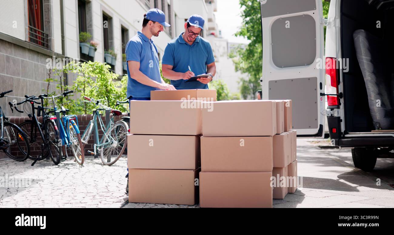 Efficient Mover Delivers And Unloads Boxes With Professional Service Stock Photo