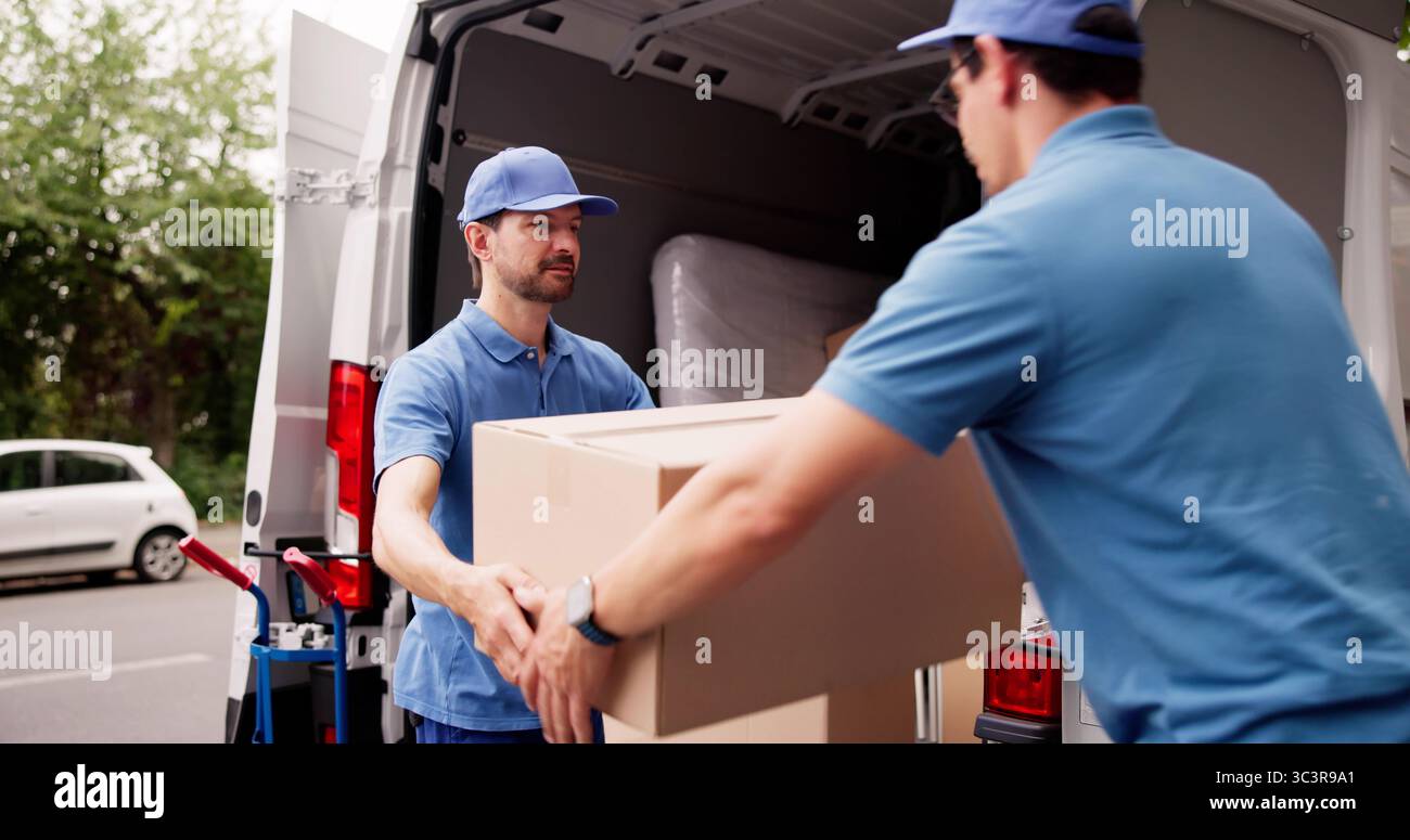 Man Unloading Boxes From Van For Removal And Delivery Service, Teamwork. Stock Photo