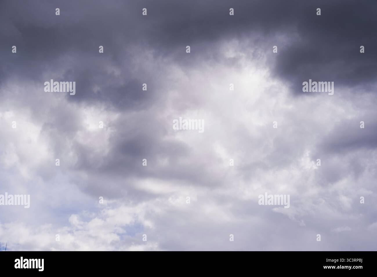 White, gray, blue clouds moving across the sky, selective focus, copy space Stock Photo