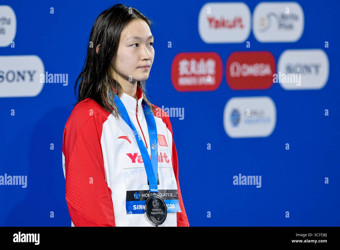 Bingjie Li of China stands with the silver medal after competing in the ...