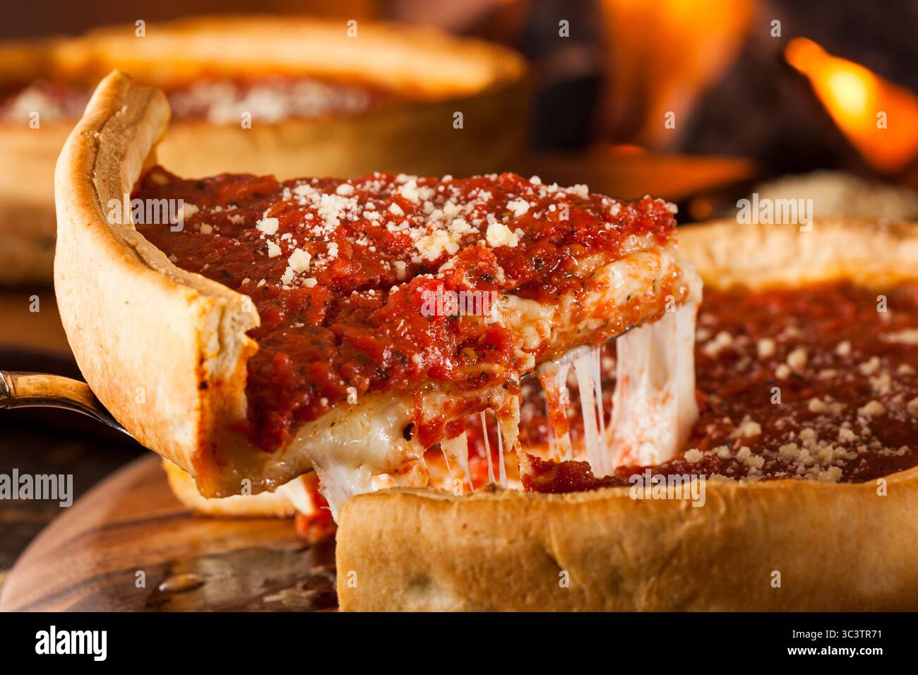 Chicago Style Deep Dish Cheese Pizza with Tomato Sauce Stock Photo