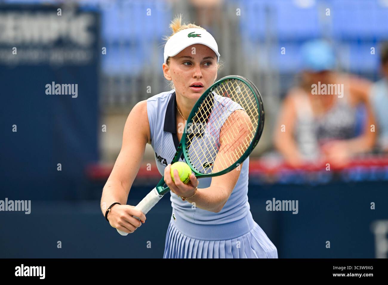 montreal-qc-july-27-polina-kudermetova-serves-the-ball-during-a