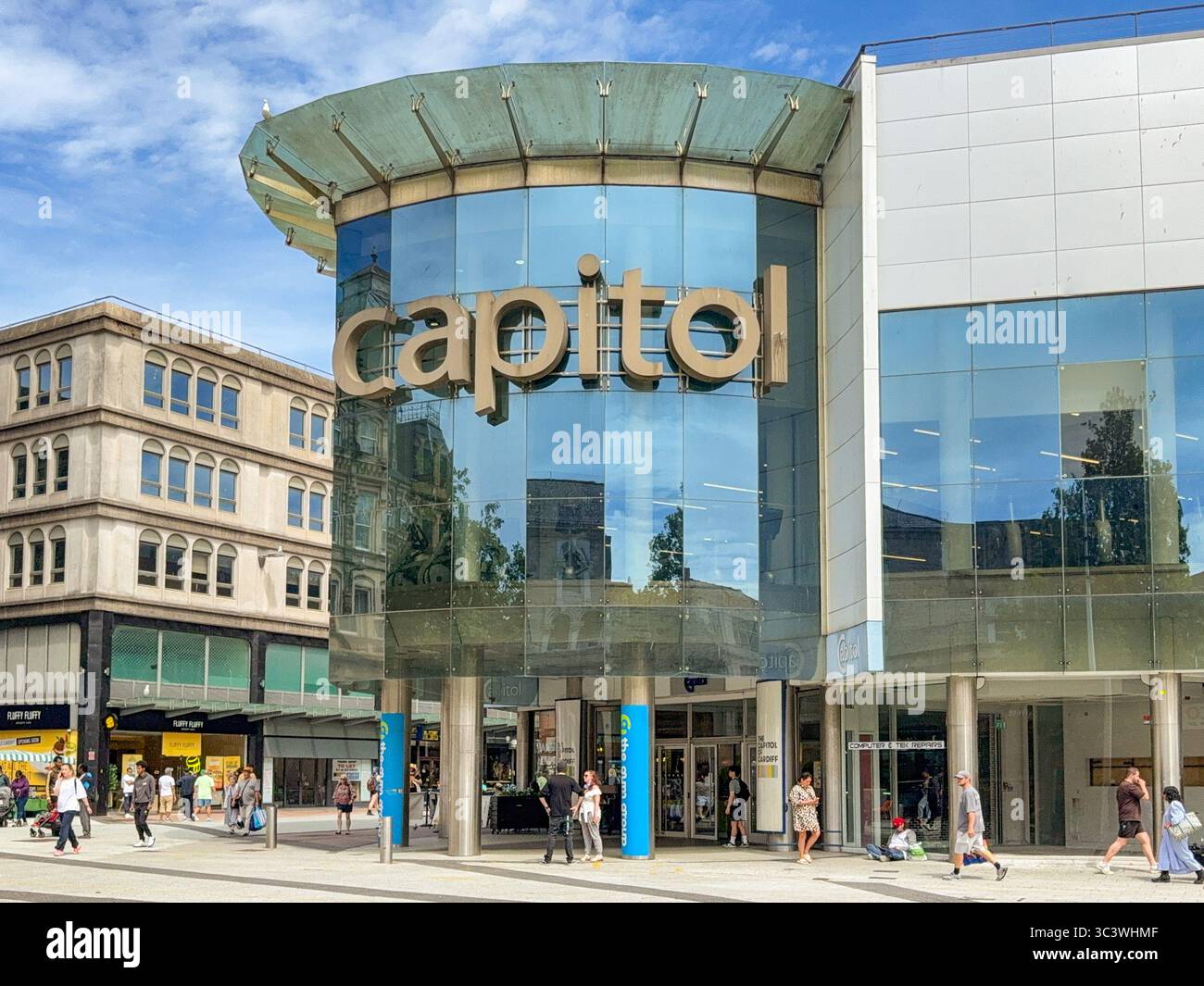 Cardiff, Wales, UK - 16 July 2025: Front exterior view of the entrance to the Capitol shopping centre on Queen Street in Cardiff city centre. - Smartphone Captured Stock Image