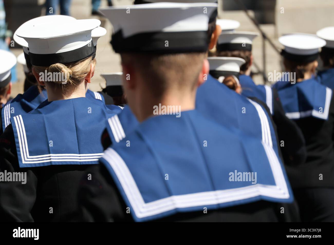 Navy sailors in uniform with their backs to camera Uniformed Heads and ...