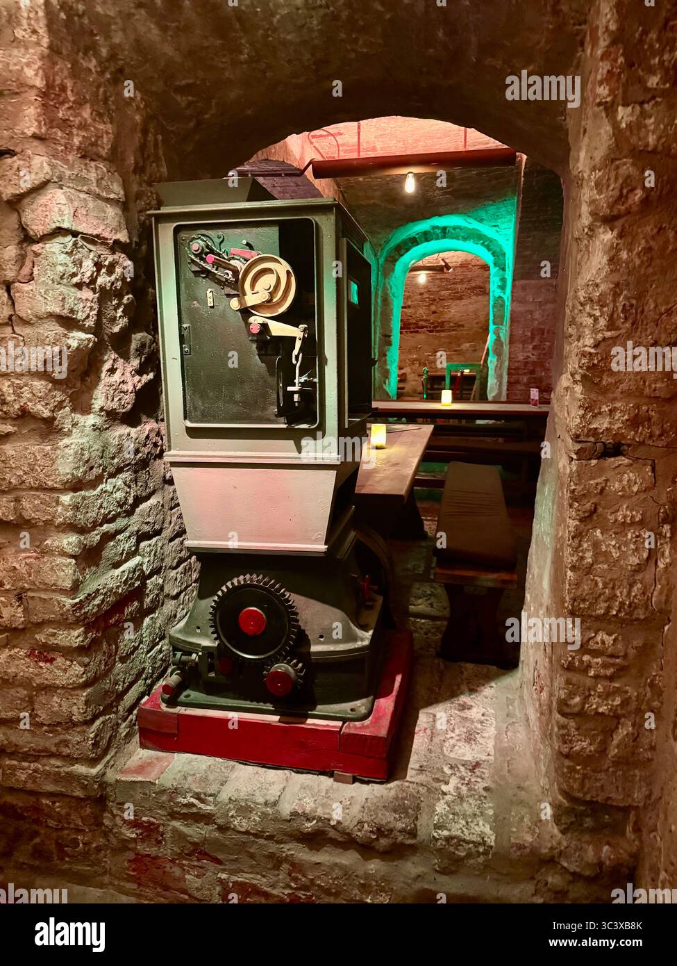 Traditional brewery cellar interior at Brauberger in Lübeck, Germany, showcasing historic brewing equipment, medieval decor, and cultural heritage. - Smartphone Captured Stock Image