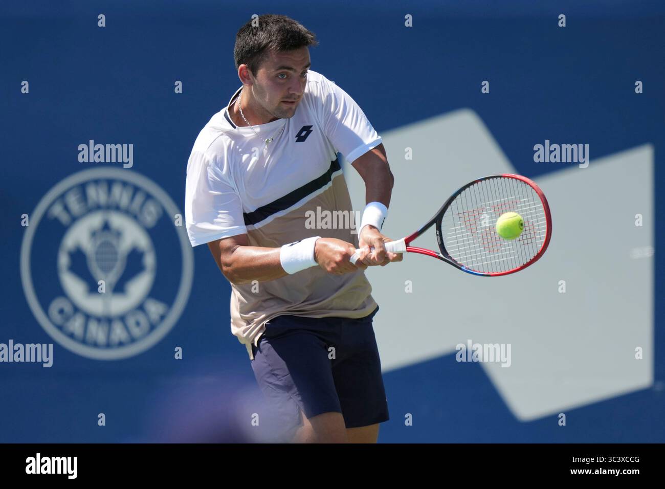 Toronto, Canada. 27th July, 2025. Tomas Barrios Vera of Chile plays a backhand against Gael Monfils of France during the Men's Singles first round match on day 2 of the ATP Masters 1000 National Bank Open at Sobeys Stadium. on July 27, 2025 in Toronto, Canada. (Photo by Leonardo Ramirez/ Credit: Eyepix Group/Alamy Live News Stock Photo