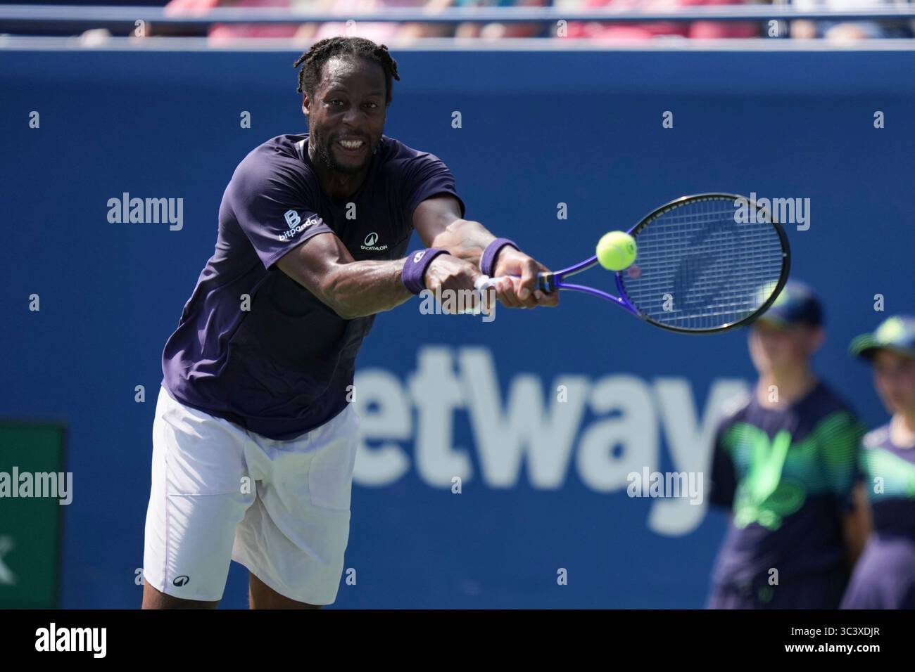 Toronto, Canada. 27th July, 2025. Gael Monfils of France plays a backhand against Tomas Barrios Vera of Chile during the Men's Singles first round match on day 2 of the ATP Masters 1000 National Bank Open at Sobeys Stadium. on July 27, 2025 in Toronto, Canada. (Photo by Leonardo Ramirez/ Eyepix Group/Sipa USA) Credit: Sipa USA/Alamy Live News Stock Photo