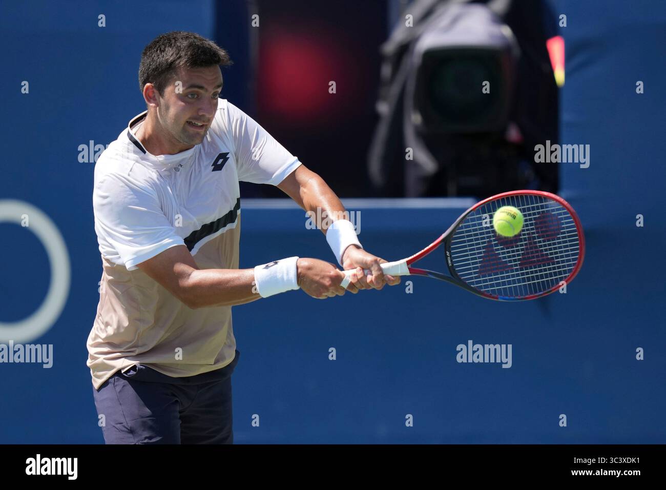 Toronto, Canada. 27th July, 2025. Tomas Barrios Vera of Chile plays a backhand against Gael Monfils of France during the Men's Singles first round match on day 2 of the ATP Masters 1000 National Bank Open at Sobeys Stadium. on July 27, 2025 in Toronto, Canada. (Photo by Leonardo Ramirez/ Eyepix Group/Sipa USA) Credit: Sipa USA/Alamy Live News Stock Photo