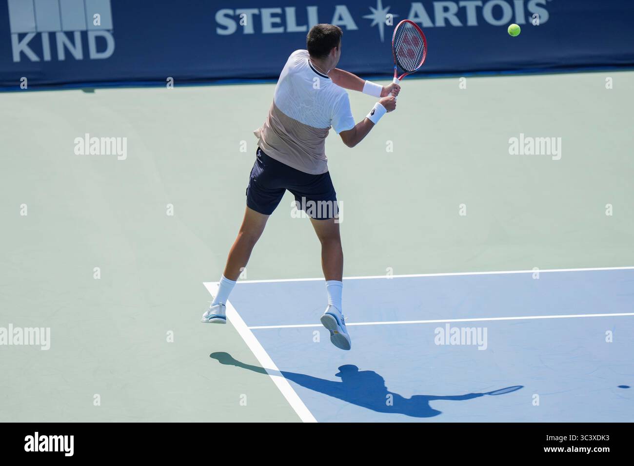 Toronto, Canada. 27th July, 2025. Tomas Barrios Vera of Chile plays a backhand against Gael Monfils of France during the Men's Singles first round match on day 2 of the ATP Masters 1000 National Bank Open at Sobeys Stadium. on July 27, 2025 in Toronto, Canada. (Photo by Leonardo Ramirez/ Eyepix Group/Sipa USA) Credit: Sipa USA/Alamy Live News Stock Photo