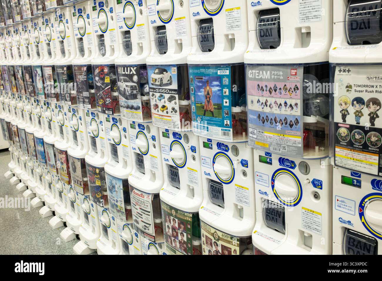 Shopping Machine Sendai, Japan - April 16 2025: Capsule vending machines are placed in ...